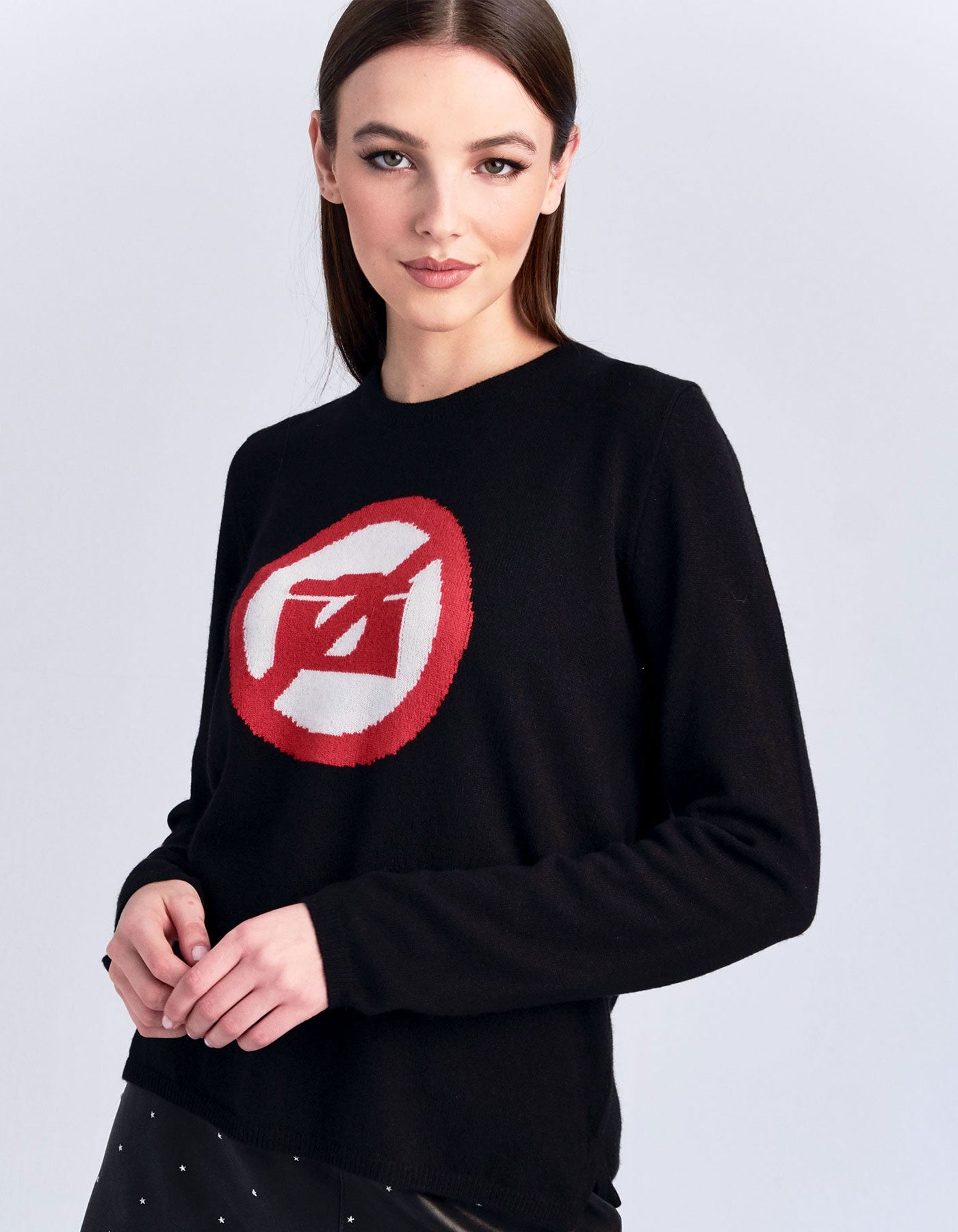 No photos allowed red and black cashmere jumpers.