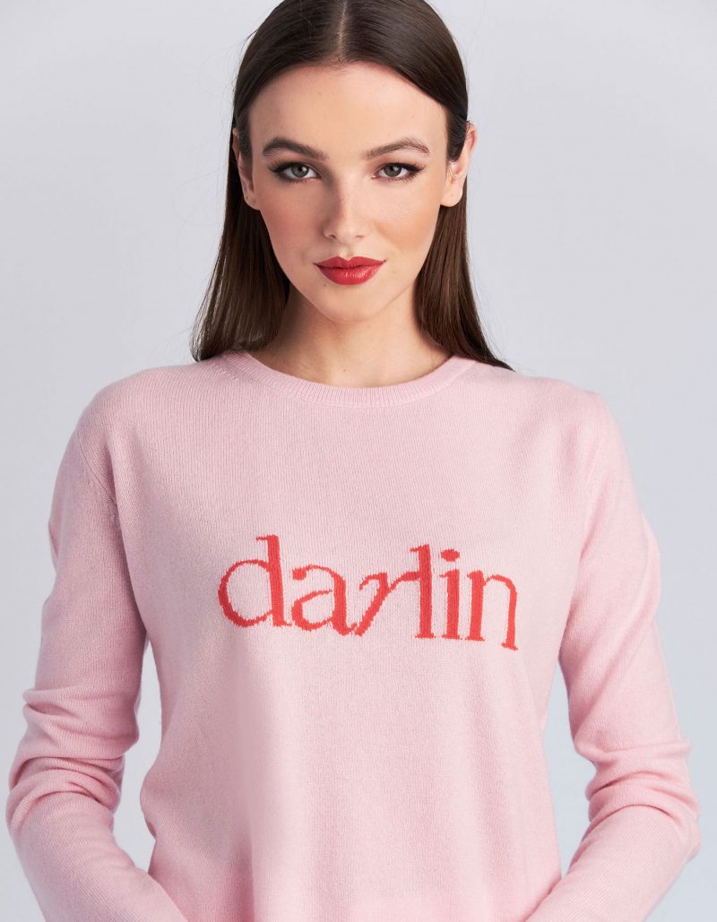 Studio photograph of malin darlin cashmere knitwear, the Darlin Pink designer cashmere jumper.