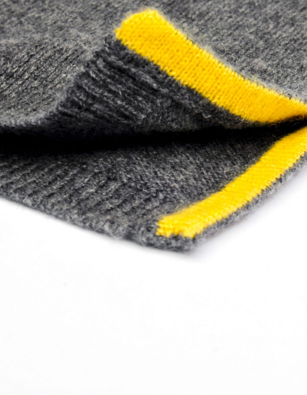 Detail close up of a malin darlin designer cashmere jumper.