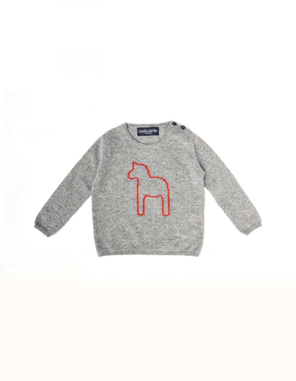 The grey baby pony kids cashmere jumper laid flat on a white back drop.