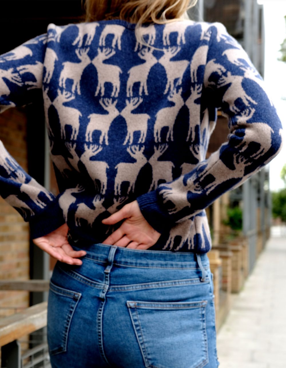 Back view of a navy Reindeer cashmere jumper by Malin Darlin.