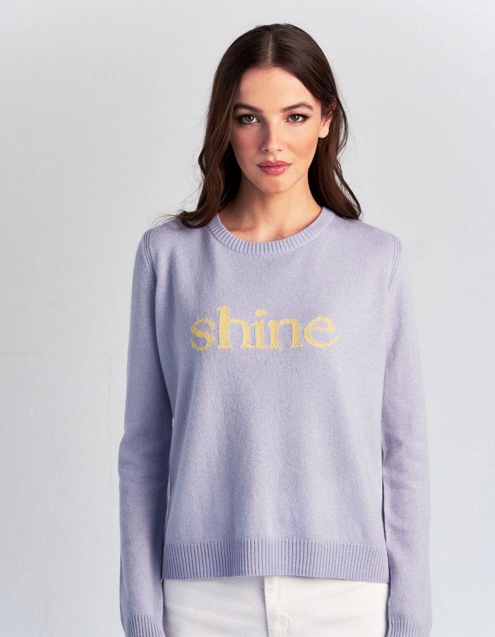 A woman modelling malin darlin womens designer cashmere, the Shine cashmere jumper.
